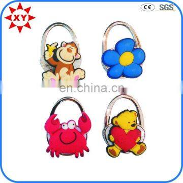 2015 new promotion wholesale cute design silicone purse hanger