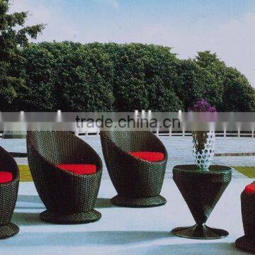 black rattan outdoor furniture with red cushion