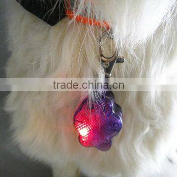 Paw-shaped flashing pet tag with keyring