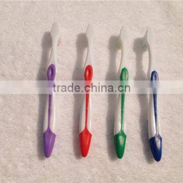 Wholesale supermarket toothbrush with soft rubber handle for adult