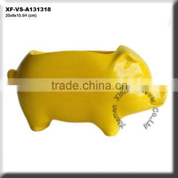 yellow ceramic pig flower pot