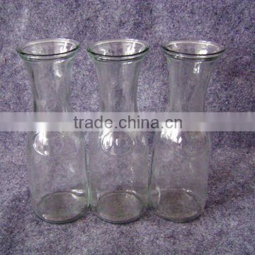 clear glass milk bottle