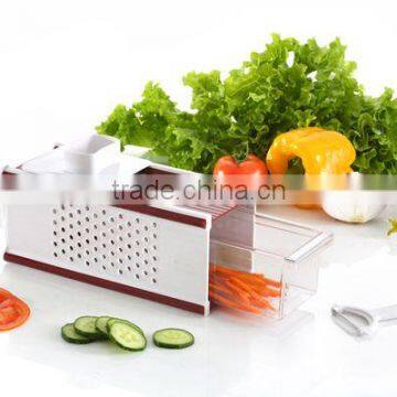 Hand-Held Vegetable and Fruit Slicer