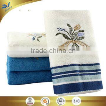 china manufacturer bamboo jacquarded border face towel with orchid embroidery 35cm*75cm