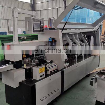 PVC Belt Banding Wood MDF CHIPBOARD Cabinet Edge Bander Machine Fine Trim Option Pre-milling Corner Trim Function Price photo-4