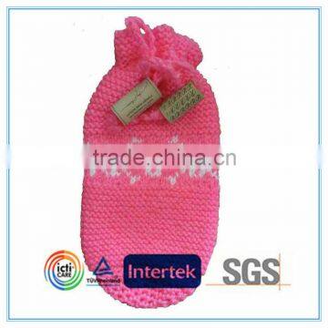Pink knitted wine bottle cover