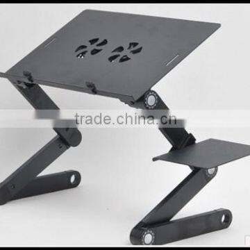 folding laptop desk on bed