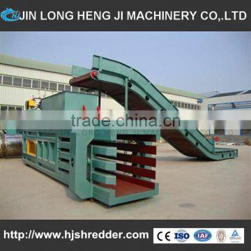 Automatic strapping baler machine,used clothes and textile compress baler machine for sale