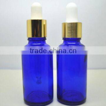 50ml cobalt blue cosmetic glass bottle with golden dropper