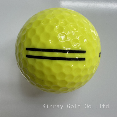 Yellow range golf ball with print