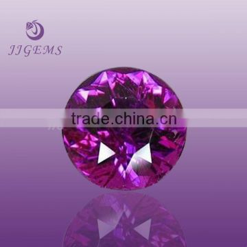 dark pink round synthetic corundum rough