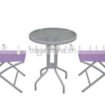 Round Table and Textile Folding Chair