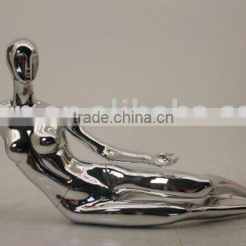 Chrome fashion lying female mannequin