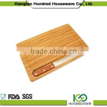 wooden bread board cutting board with knife