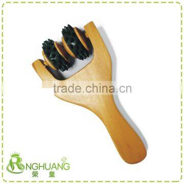 Wooden face massager with plasic knot