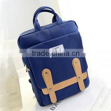 blue canvas travel backpack with laptop compartment