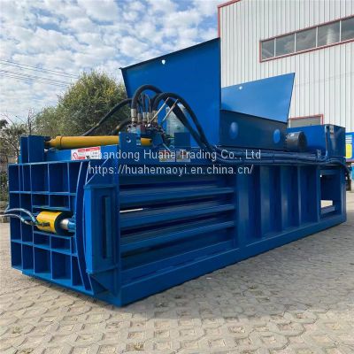 Full automatic horizontal hydraulic packer can, mineral water bottle, compressed waste carton, cardboard, old clothes, woven bag, pressing, automatic threading, automatic strapping