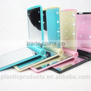 new design 8 pcs folding compact double sides led makeup mirror                        
                                                Quality Choice