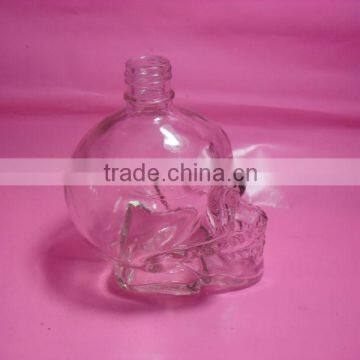 100ml, 200ml, 250ml screw neck skull shape glass bottle