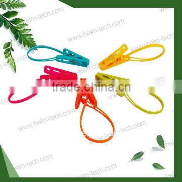 Small plastic rope clips pegs