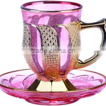 Golden tea cup and saucer set