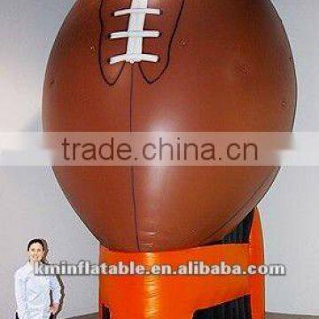 giant inflatable football on tee