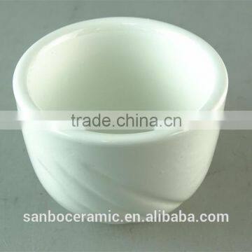 White Porcelain Cup With Embossed Wave Design photo-2