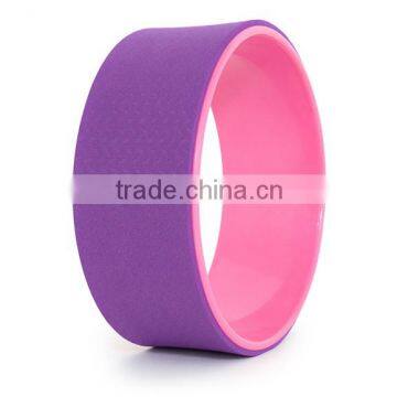 purple-pink yoga wheel