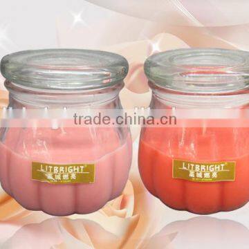 Scented candle in glass jar with lid