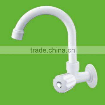 white plastic kitchen sink tap