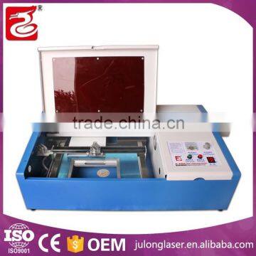 hot sale 3020 320 co2 laser cutting machine co2 laser cutter for cut acrylic poly glass wedding invitation card
