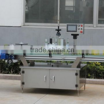 Automatic carton label attaching machine