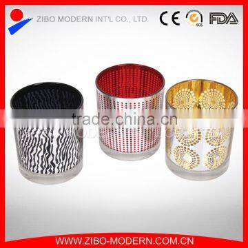Printed colourful glass candle holder with metal handle