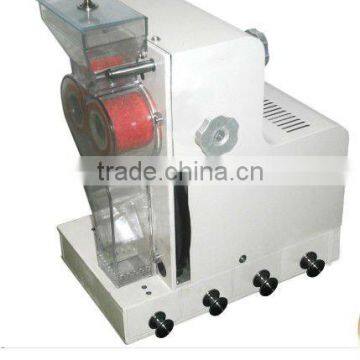 Ecperimental rice hulling machine