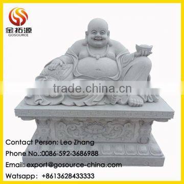 laughing buddha stone statue