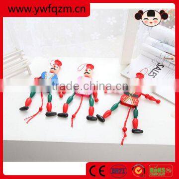 Children play wooden string puppet toy