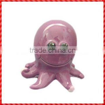 Lovely pink little ceramic octopus shaped of animal coin box