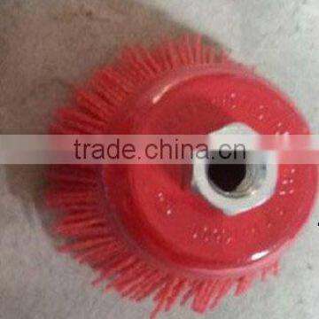 Abrasive filaments cup brush