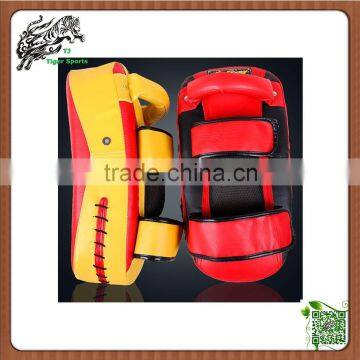 red curved thai martial arts taekwondo kick pad