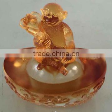 monkey with money and ruyi liuli colored glaze amber decoration