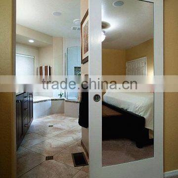 White sliding door with beveled mirror for bathroom