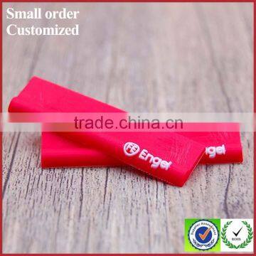 Private Red Embossed Logo Heat Transfer Silicone Label for Mens Jeans photo-2