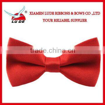 Wholesale Fasion satin ribbon bow with elastic band for packing.