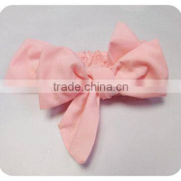 Wholesale Lovely Pom Pom Headband In Plain Pale Pink