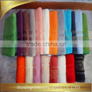 Wholesale stock lot terry cotton towels jacquard cotton bath towel