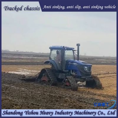 2004 Tractor modification with triangular track wheels for anti-skid on muddy ground