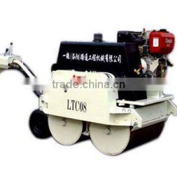 Hydraulic walking behind vibratory roller