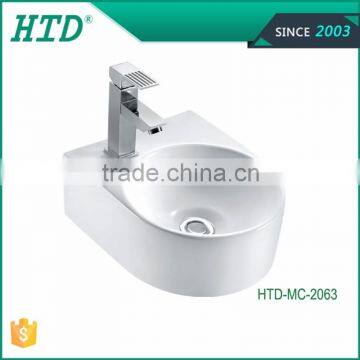 HTD-MC-2063 Ceramic top mounted sanitary ware art basin manufacturer counter wash basin