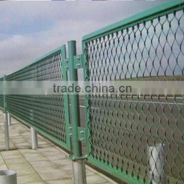 Expanded wire mesh fence