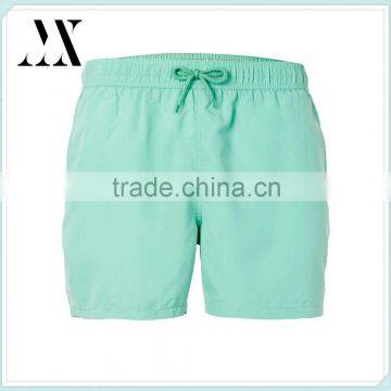 Hot selling 100% polyester mesh lining regular length light mint green swim shorts